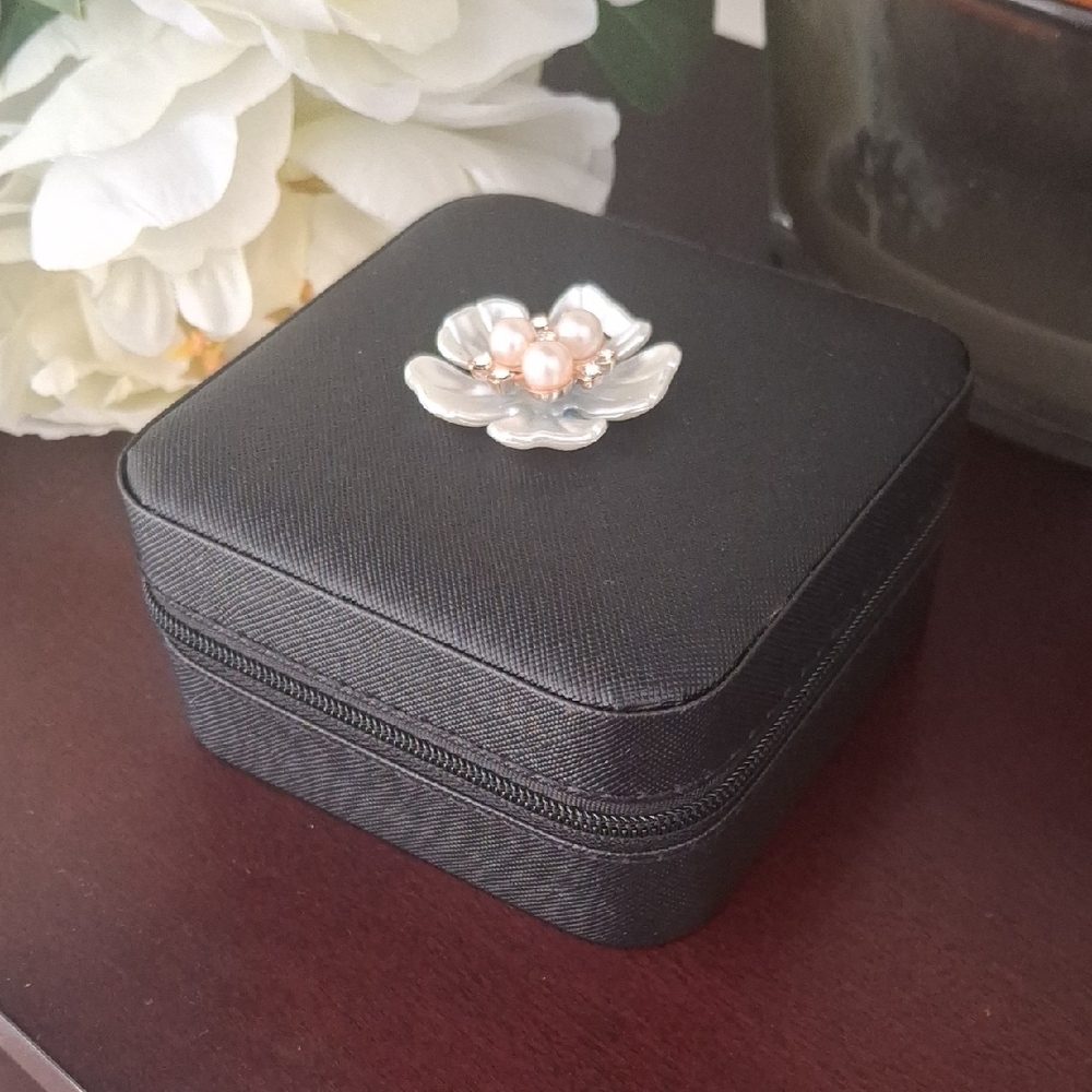 Elegant Black Jewelry Box with Floral Accent